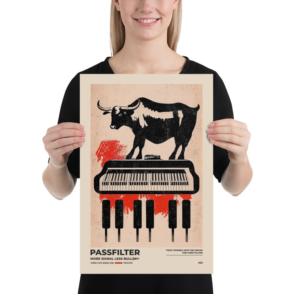 Musician holding a Passfilter poster with a picture of a robot synthesizer bull in the style of old rodeo posters.