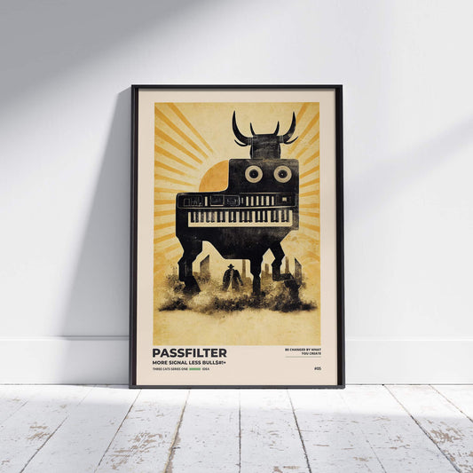 Black framed Passfilter poster sitting on a white wooden floor in a recording studio.