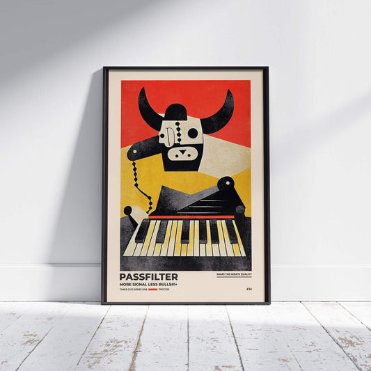 Black framed Passfilter poster sitting on a white wooden floor in a recording studio.