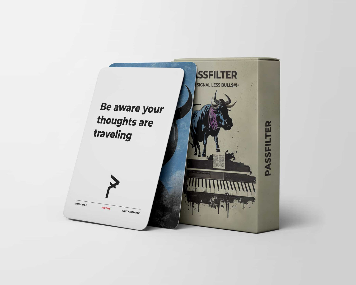 A photograph of Passfilter Creative Card Deck. The card says "Be aware your thoughts are traveling"